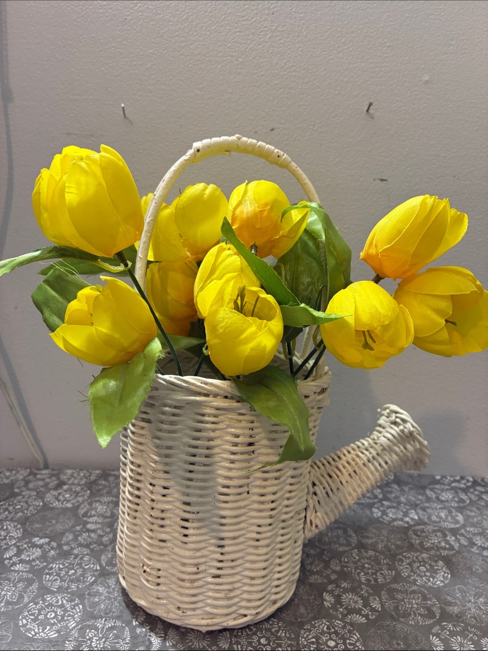 Yellow Artificial Tulip Arrangement in White Wicker Watering Can